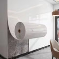 Self-adhesive wallpaper with thick foam marble imitation.
